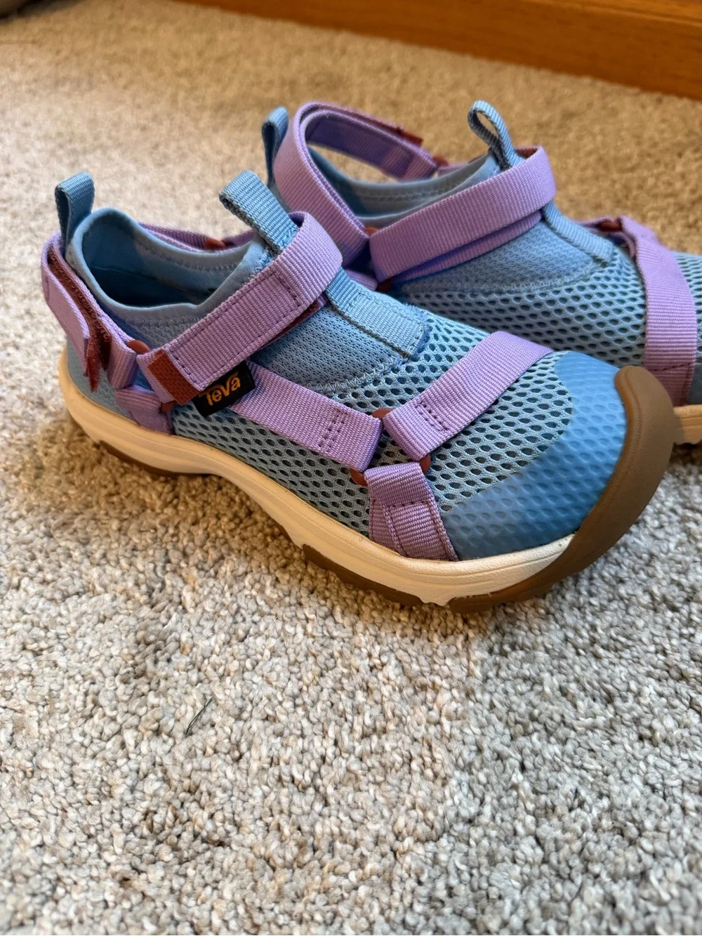 Teva Kids Outflow Sandal in Blue with Lilac Straps and Brown Toe